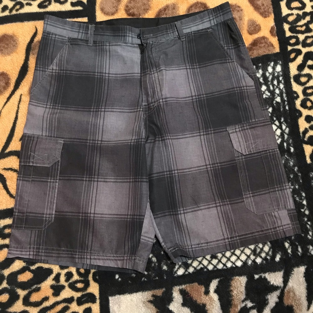 Men’s black board shorts.